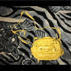 yellow purse from claire’s